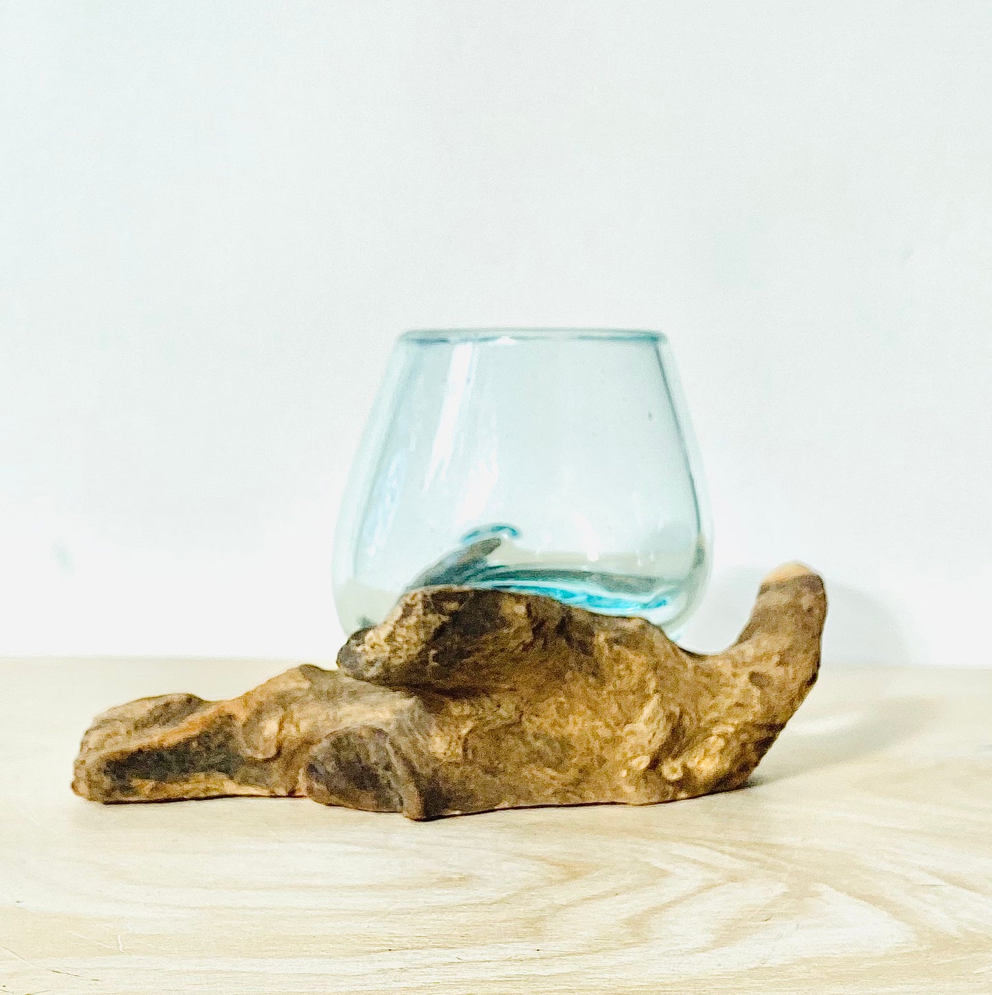 Small Molten Glass Vase over Wood