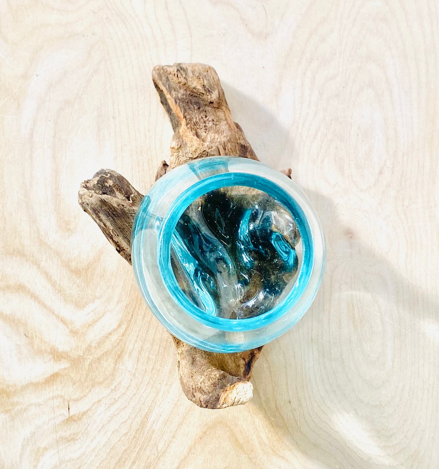Small Molten Glass Vase over Wood